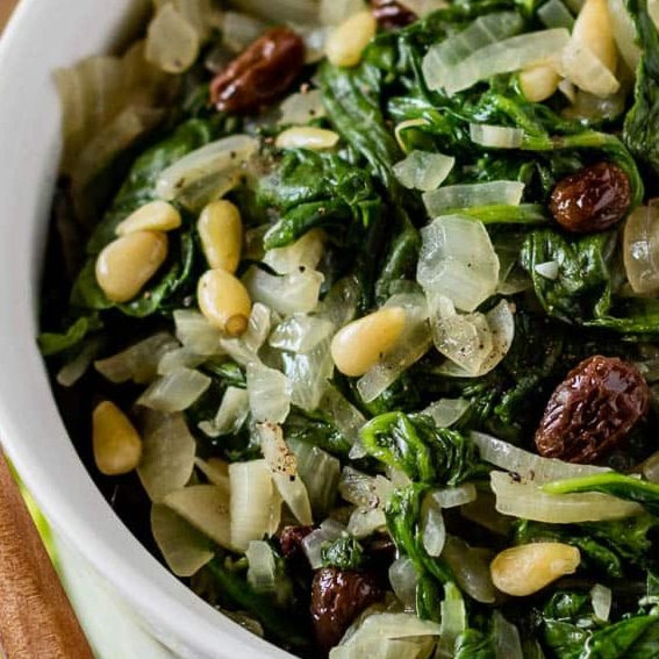 Savory Spinach Tapas with Toasted Pine Nuts and Sweet Raisins