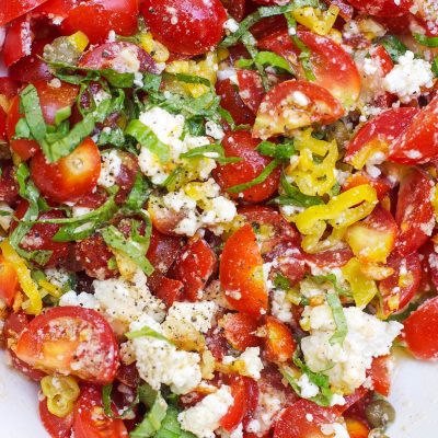 Sizzling Tomatoes Topped With Crispy Thyme And Goat Cheese