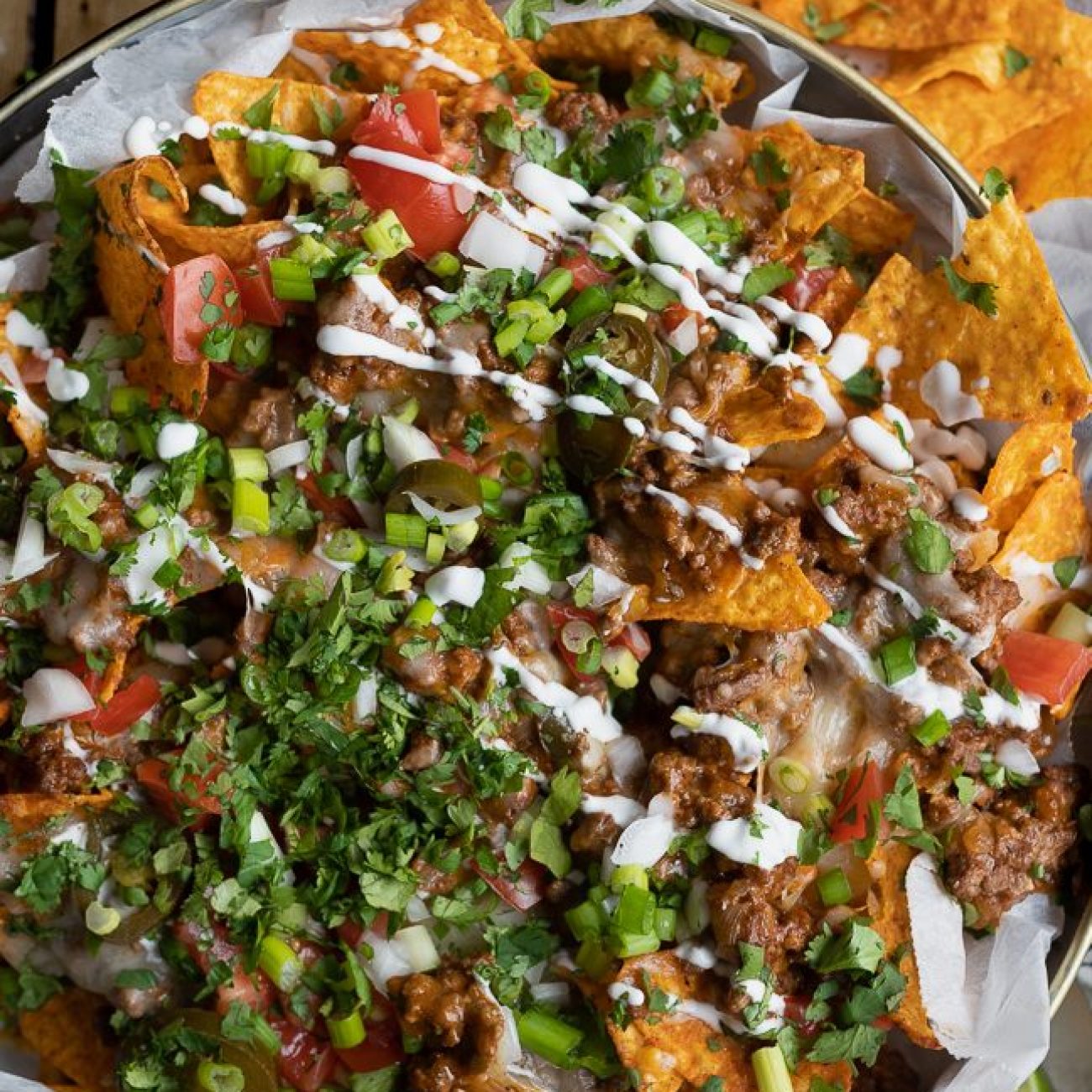 Ultimate Texas-Style Loaded Queso Dip with Taco Meat, Guacamole, and Sour Cream